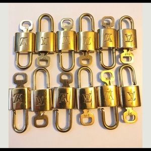Louis Vuitton Accessories - 2 Louis Vuitton lock and key sets Louis Vuitton Accessories - 2 Louis Vuitton lock and key sets